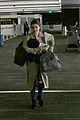 lucy hale carries rottweiler bag while traveling home for easter 07