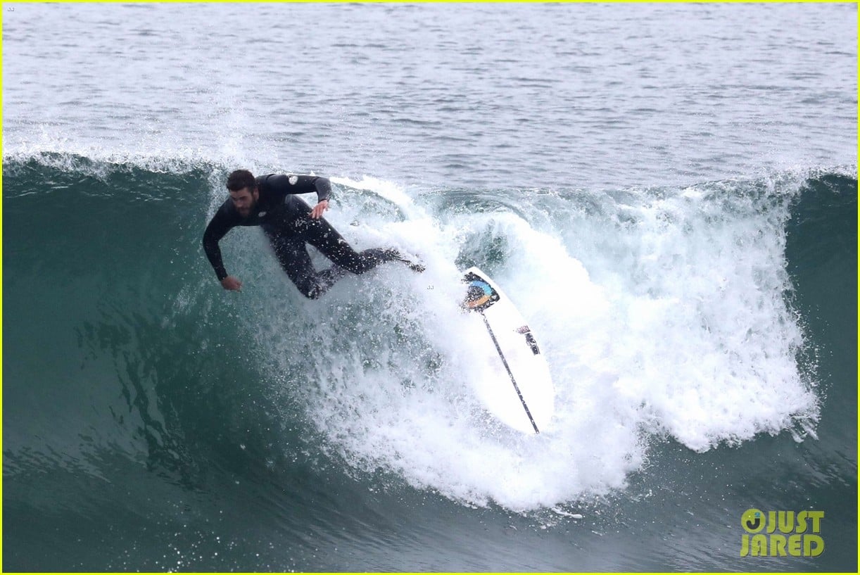 liam hemsworth puts surfing skills on display in malibu 06
