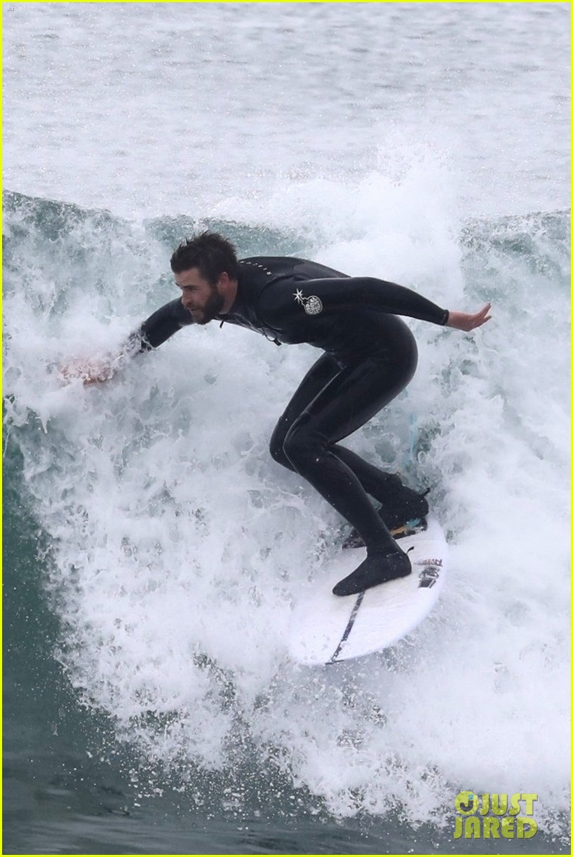liam hemsworth puts surfing skills on display in malibu 11