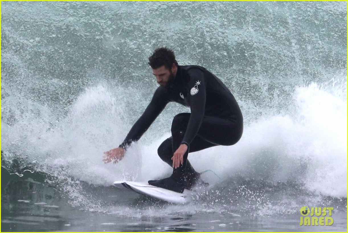 liam hemsworth puts surfing skills on display in malibu 12