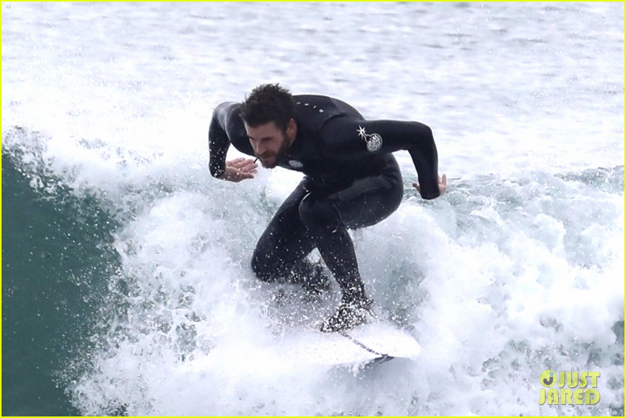 liam hemsworth puts surfing skills on display in malibu 16