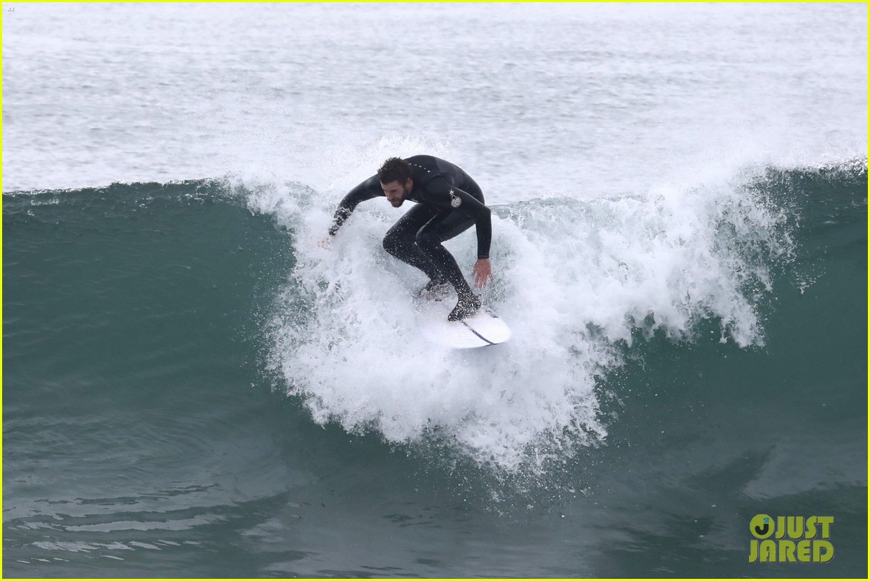 liam hemsworth puts surfing skills on display in malibu 17