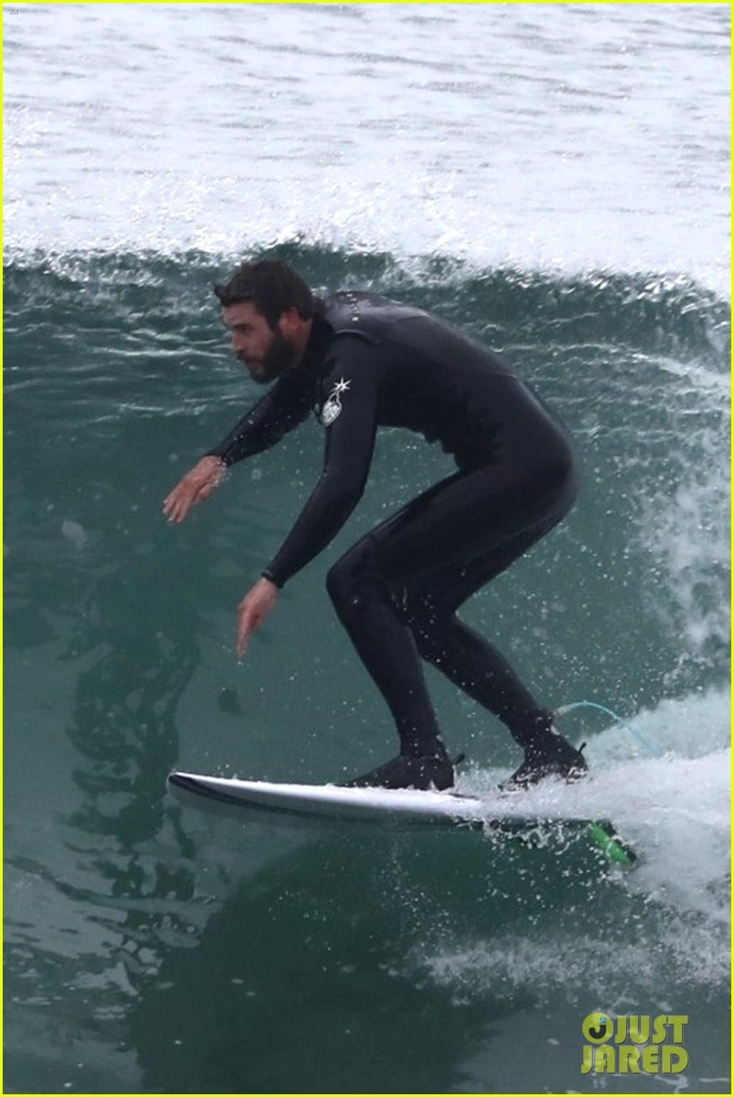 liam hemsworth puts surfing skills on display in malibu 20