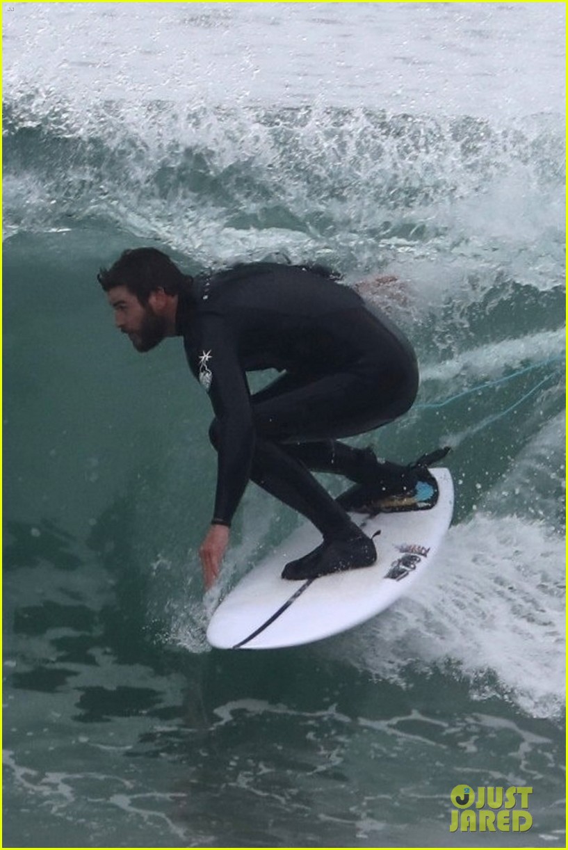 liam hemsworth puts surfing skills on display in malibu 21