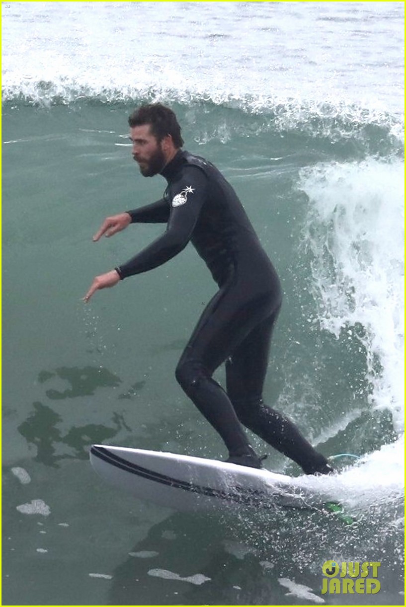 liam hemsworth puts surfing skills on display in malibu 28