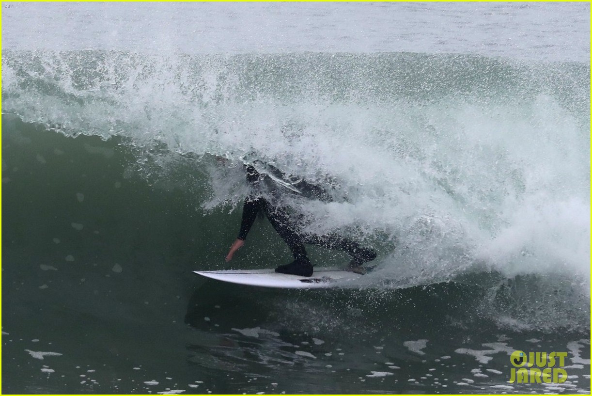 liam hemsworth puts surfing skills on display in malibu 32