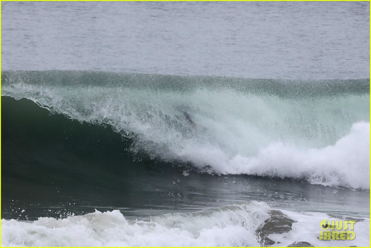 liam hemsworth puts surfing skills on display in malibu 33