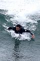 liam hemsworth puts surfing skills on display in malibu 14