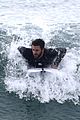 liam hemsworth puts surfing skills on display in malibu 15