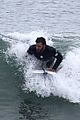 liam hemsworth puts surfing skills on display in malibu 25