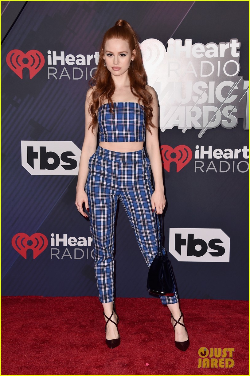 madelaine petsch gets a kiss from travis mills at iheart radio music awards 08
