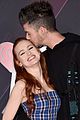 madelaine petsch gets a kiss from travis mills at iheart radio music awards 06