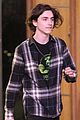 timothee chalamet is all smiles while out with a friend in london 05