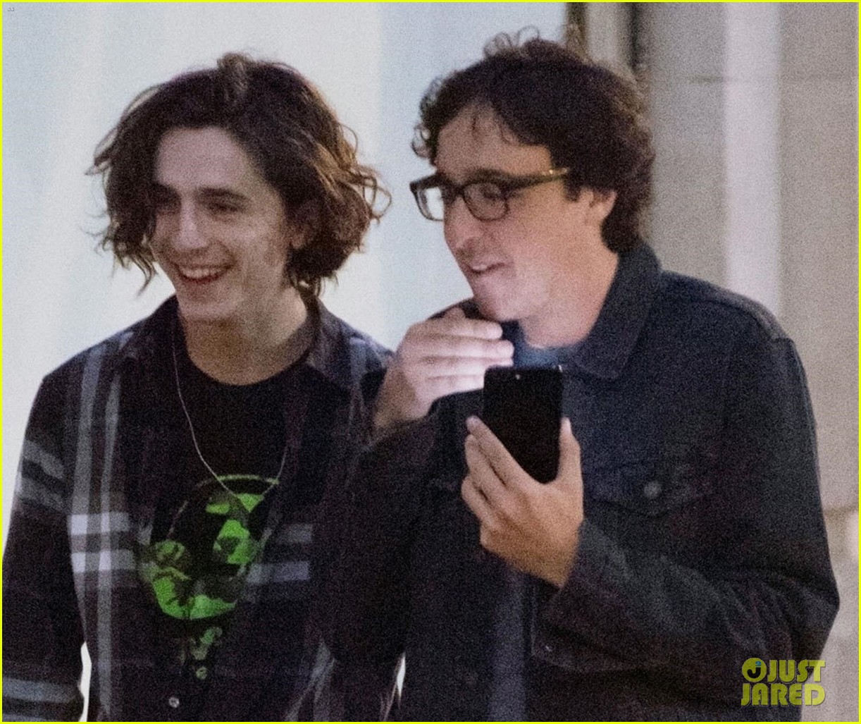 timothee chalamet is all smiles while out with a friend in london 01