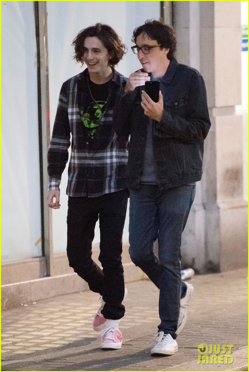 timothee chalamet is all smiles while out with a friend in london 07