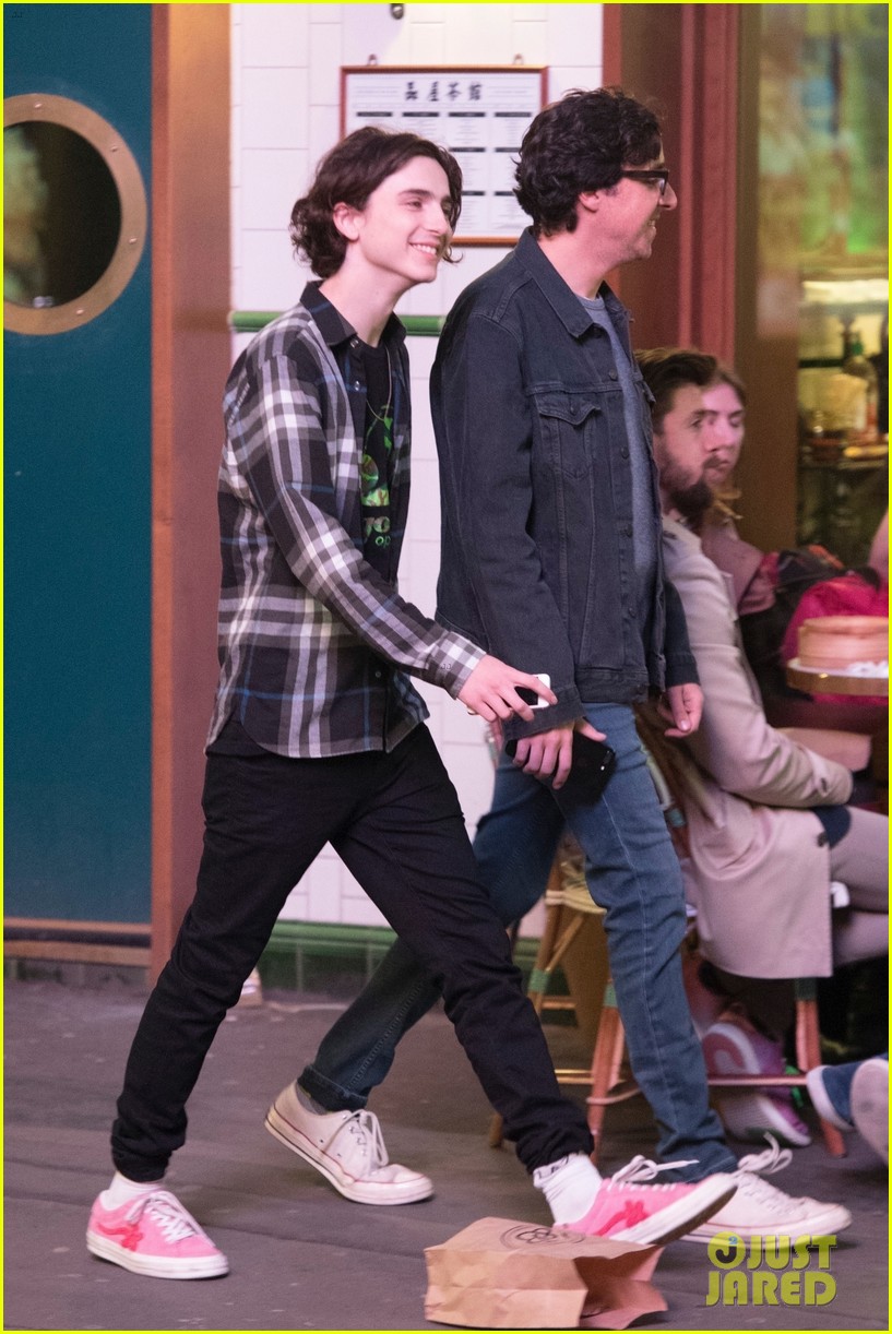timothee chalamet is all smiles while out with a friend in london 08