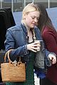 dakota fanning keeps it casual and trendy for la business meeting 02