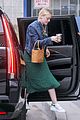 dakota fanning keeps it casual and trendy for la business meeting 03