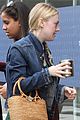 dakota fanning keeps it casual and trendy for la business meeting 06