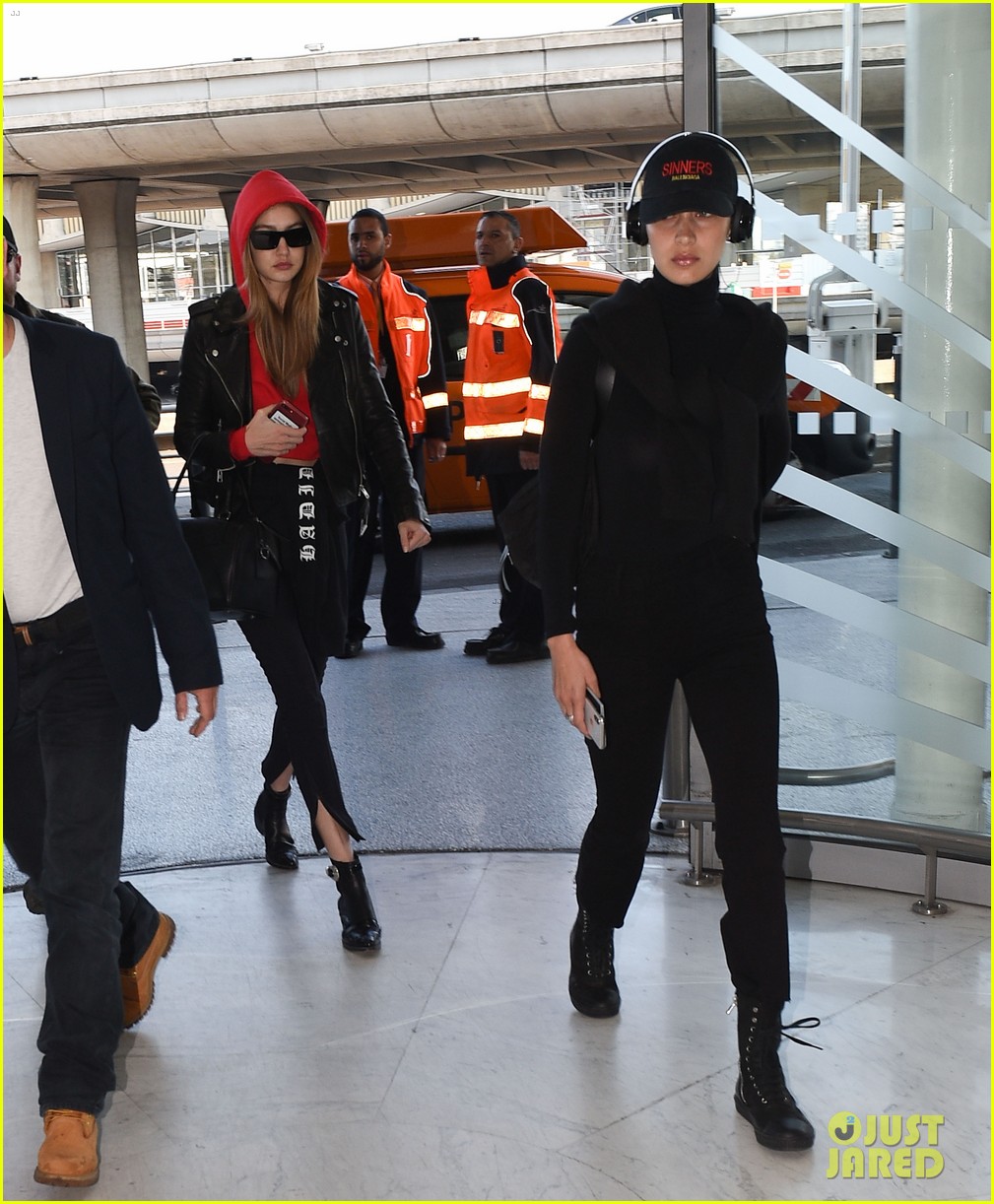 gigi and bella hadid coordinate their looks while arriving back in nyc 04