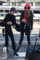 gigi and bella hadid coordinate their looks while arriving back in nyc 01