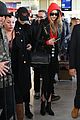 gigi and bella hadid coordinate their looks while arriving back in nyc 06