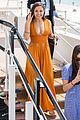 inanna sarkis talks action visuals cannes orange dress 03