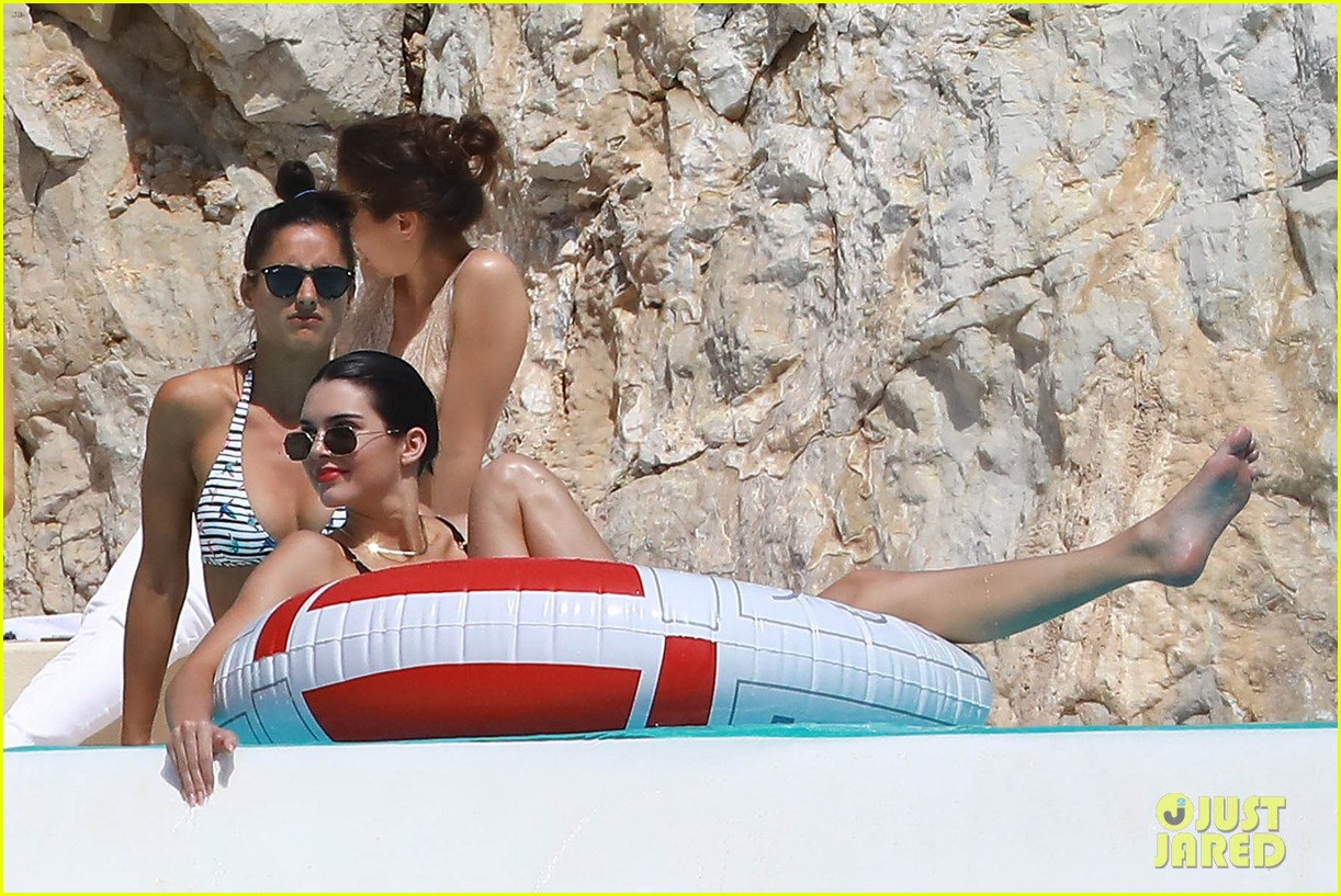 kendall jenner rocks black thong swimsuit while poolside in cannes 06