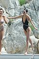 kendall jenner rocks black thong swimsuit while poolside in cannes 02