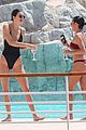 kendall jenner rocks black thong swimsuit while poolside in cannes 03