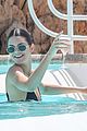 kendall jenner rocks black thong swimsuit while poolside in cannes 04