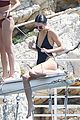 kendall jenner rocks black thong swimsuit while poolside in cannes 10