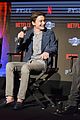 millie bobby brown naoh schnapp hold hands at stranger things panel 06
