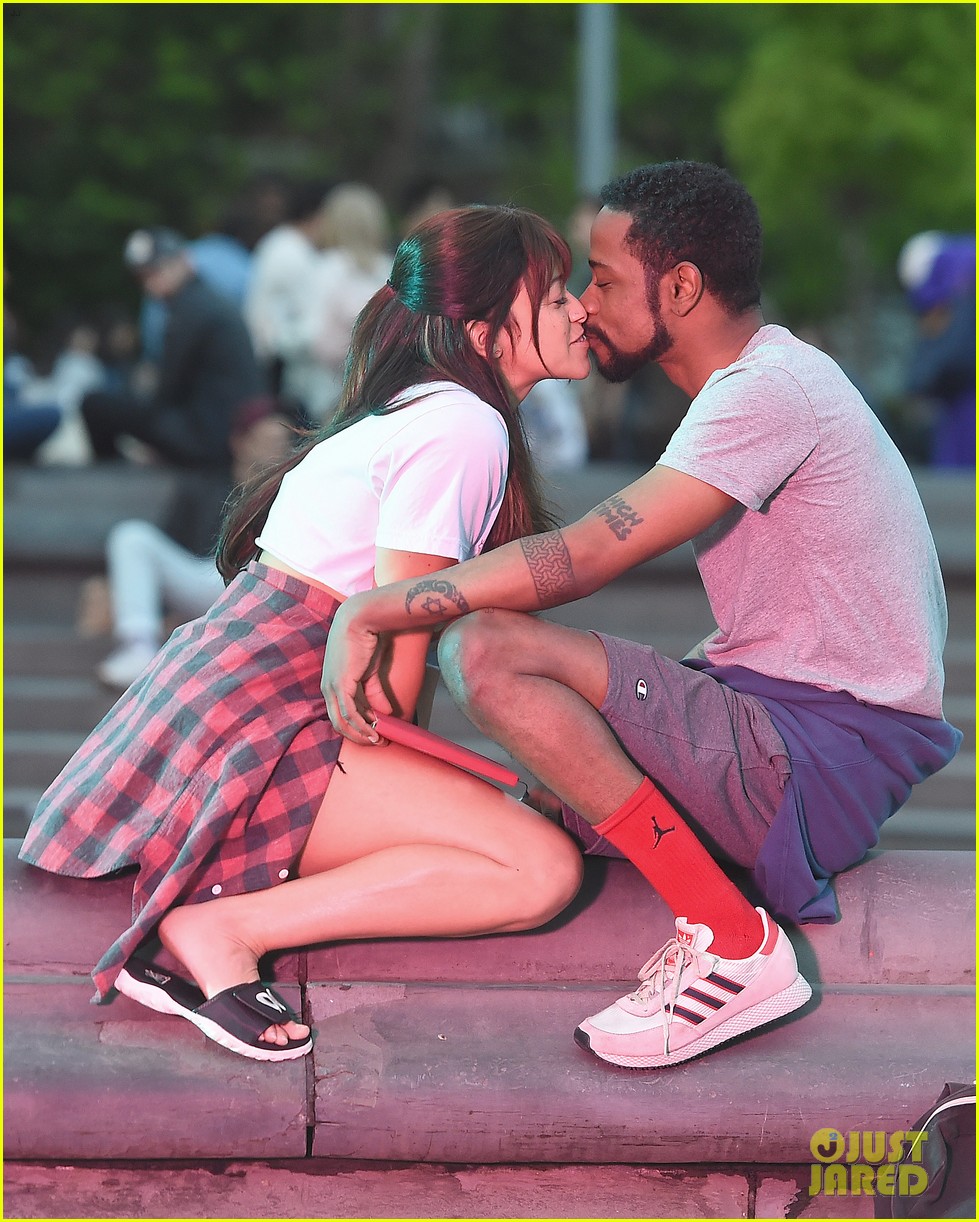 gina rodriguez and lakeith stanfield share a kiss on someone great set 01