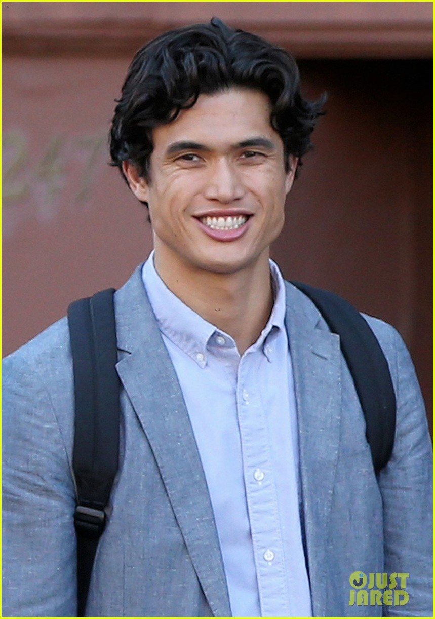 charles melton wears suit sneakers for filming 04