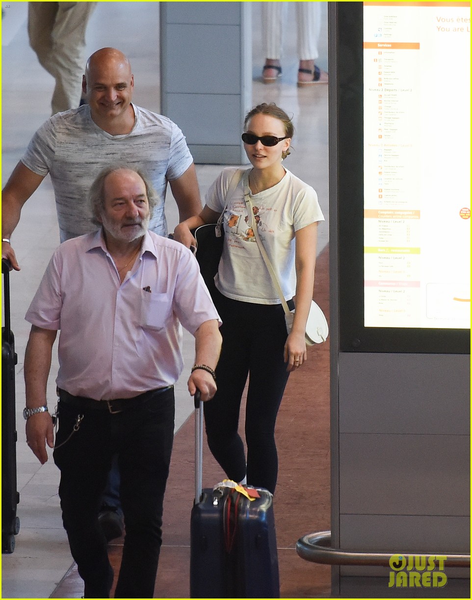 lily rose depp sports french cartoon t shirt while heading to paris 01