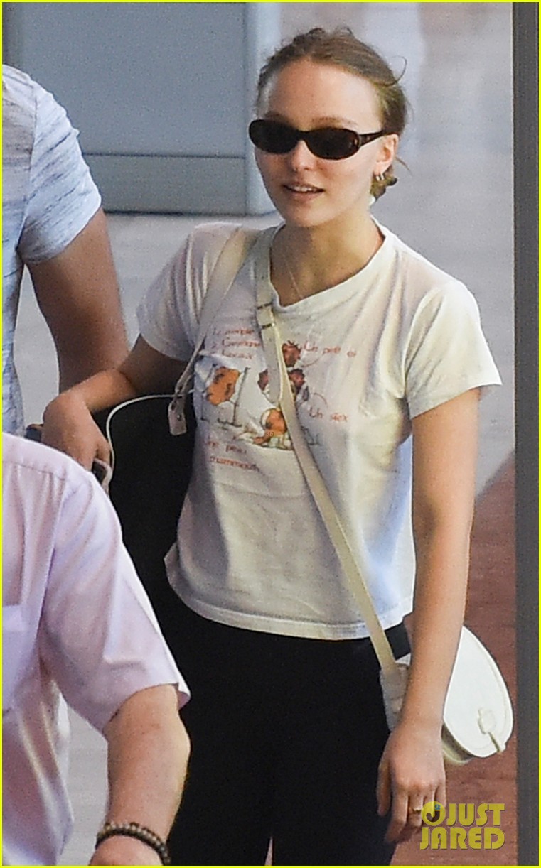 lily rose depp sports french cartoon t shirt while heading to paris 06