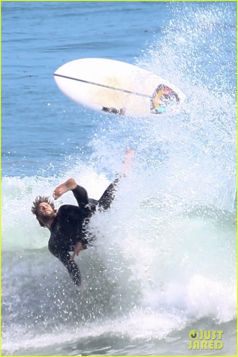 liam hemsworth goes shirtless after surfing session 03