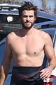 liam hemsworth goes shirtless after surfing session 02
