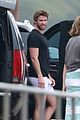 liam hemsworth bares hot bod while stripping out of wetsuit 02