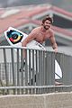 liam hemsworth bares hot bod while stripping out of wetsuit 03