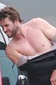 liam hemsworth bares hot bod while stripping out of wetsuit 04