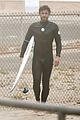 liam hemsworth bares hot bod while stripping out of wetsuit 05