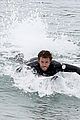 liam hemsworth bares hot bod while stripping out of wetsuit 10