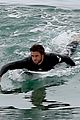 liam hemsworth bares hot bod while stripping out of wetsuit 15