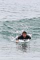 liam hemsworth bares hot bod while stripping out of wetsuit 21