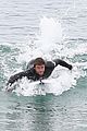 liam hemsworth bares hot bod while stripping out of wetsuit 22