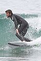 liam hemsworth bares hot bod while stripping out of wetsuit 27