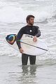 liam hemsworth bares hot bod while stripping out of wetsuit 29