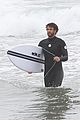 liam hemsworth bares hot bod while stripping out of wetsuit 32